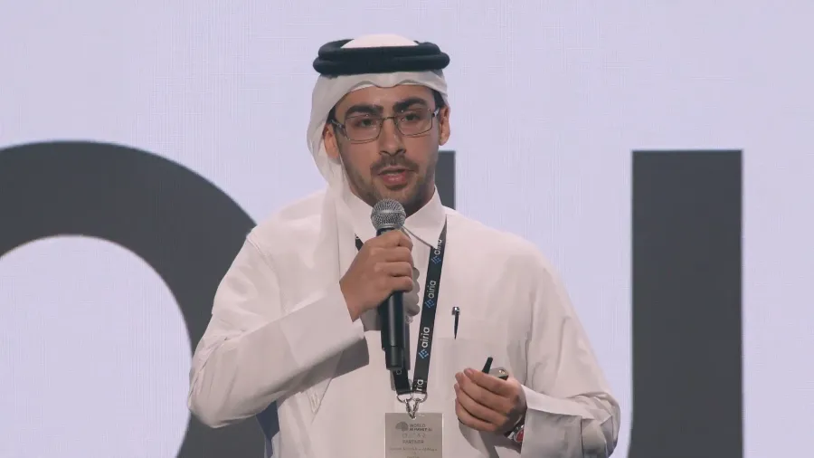 Rashid Al-Marri presenting OryxMed on stage at World Summit AI Qatar