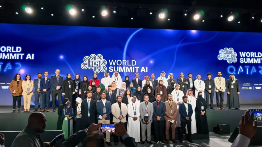 Health Tech Hackathon participants gathered on stage at World Summit AI Qatar